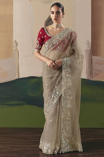 Embroidered beige fancy fabric party designer saree