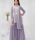 Lavender color embroideried faux geogette salwar suit