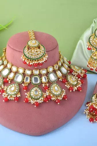 Elegant red color kundan necklace set for traditional wedding wear