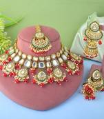 Elegant red color kundan necklace set for traditional wedding wear