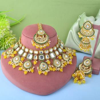 Bright yellow color kundan necklace set with royal indian design 1