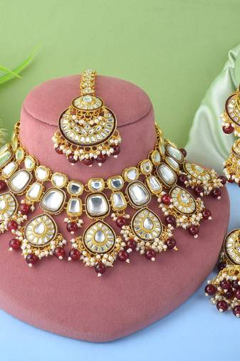 Stunning maroon color kundan necklace set for ethnic occasions