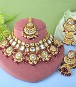 Stunning maroon color kundan necklace set for ethnic occasions