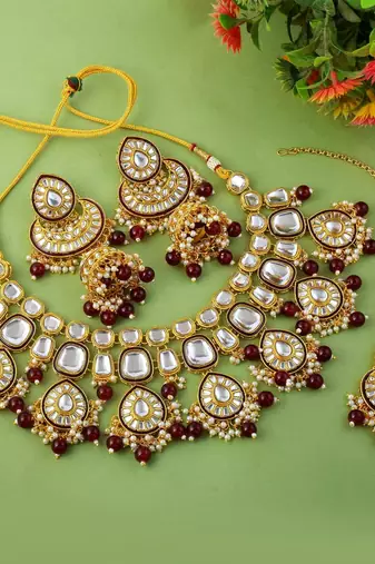 Stunning maroon color kundan necklace set for ethnic occasions
