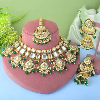 Classic green color kundan necklace set with beautiful stone detailing 1