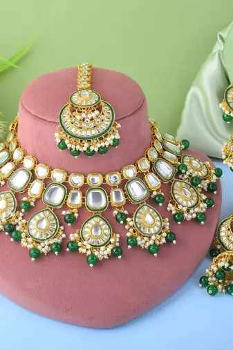 Classic green color kundan necklace set with beautiful stone detailing