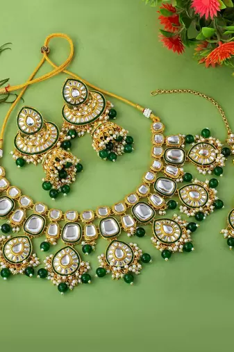 Classic green color kundan necklace set with beautiful stone detailing