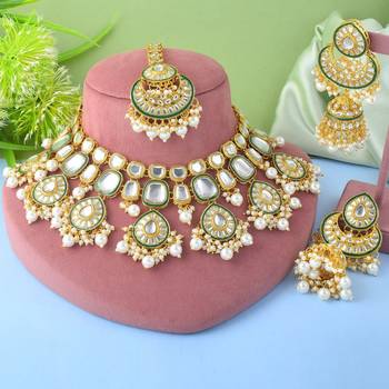 Pure white color kundan necklace set with detailed stone craftwork 1