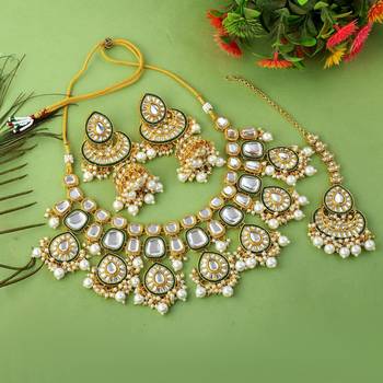 Pure white color kundan necklace set with detailed stone craftwork 2