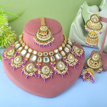 Regal purple color kundan necklace set for wedding celebrations 1