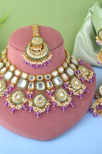Regal purple color kundan necklace set for wedding celebrations