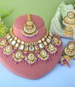 Regal purple color kundan necklace set for wedding celebrations