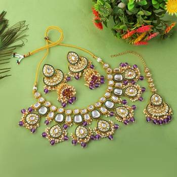 Regal purple color kundan necklace set for wedding celebrations 2