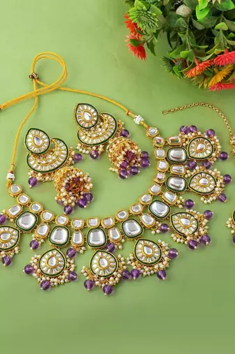 Regal purple color kundan necklace set for wedding celebrations