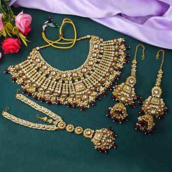 Premium maroon color kundan necklace set for elegant occasions 1