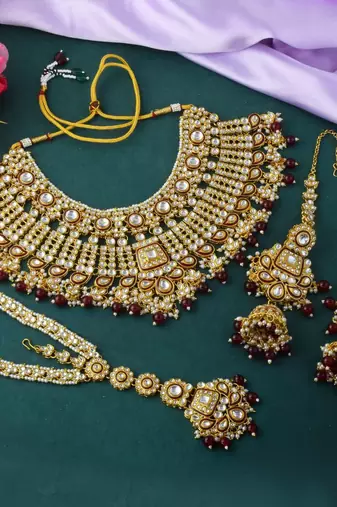 Premium maroon color kundan necklace set for elegant occasions