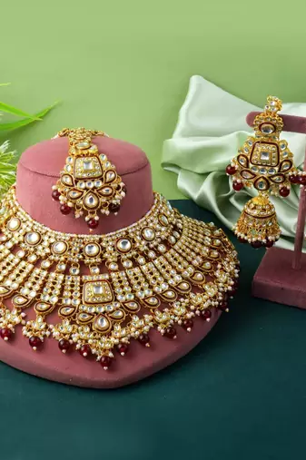Premium maroon color kundan necklace set for elegant occasions