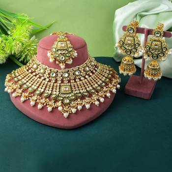 Handcrafted white color kundan necklace set with classic detailing 1
