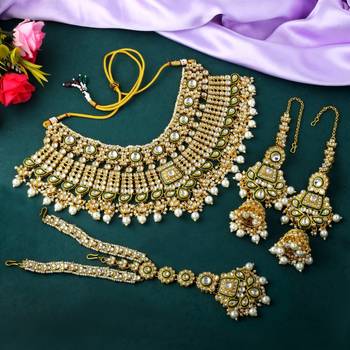 Handcrafted white color kundan necklace set with classic detailing 2