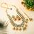 Ethnic gold color kundan necklace set with wedding stone details