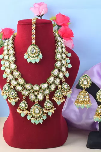 Unique pista green color kundan necklace set for festival wear