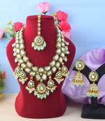 Unique pista green color kundan necklace set for festival wear