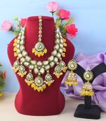 Vibrant yellow color kundan necklace set for cultural functions