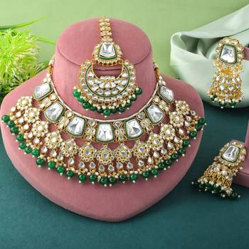 Radiant green color kundan necklace set with antique finishing 1