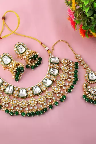 Radiant green color kundan necklace set with antique finishing