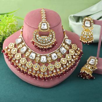 Rich maroon color kundan necklace set for engagement ceremonies 1