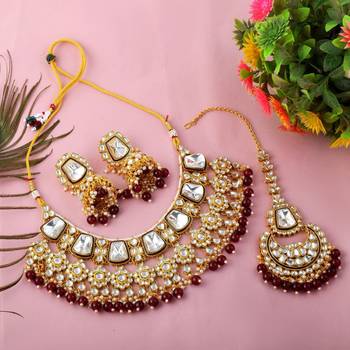 Rich maroon color kundan necklace set for engagement ceremonies 2