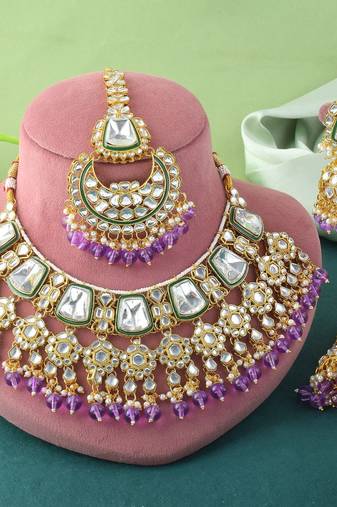 Royal purple color kundan necklace set with gold and gem detailing