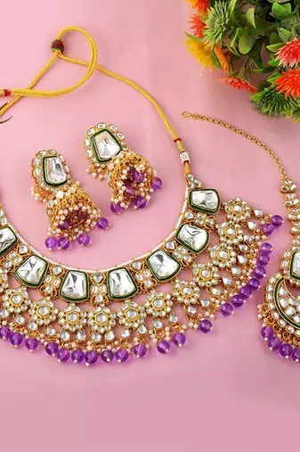 Royal purple color kundan necklace set with gold and gem detailing
