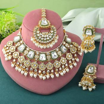 Luxurious white color kundan necklace set for classic bridal looks 1