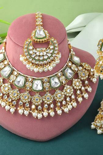 Luxurious white color kundan necklace set for classic bridal looks