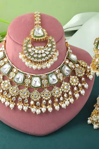 Luxurious white color kundan necklace set for classic bridal looks