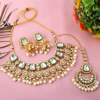 Luxurious white color kundan necklace set for classic bridal looks 2