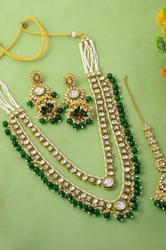 Royal green color kundan necklace set with antique detailing for events