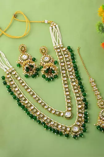 Royal green color kundan necklace set with antique detailing for events