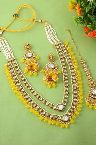 Bright yellow color kundan necklace set for traditional daytime celebrations