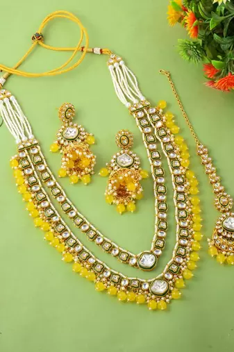 Bright yellow color kundan necklace set for traditional daytime celebrations