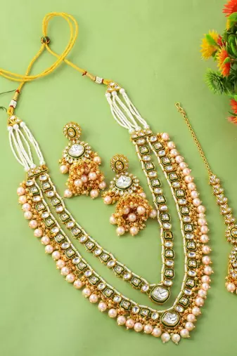 Luxury gold color kundan necklace set with bold stone decorations