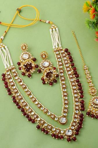 Deep maroon color kundan necklace set with wedding stone highlights