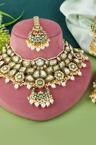 Bright white color kundan necklace set with handcrafted finish