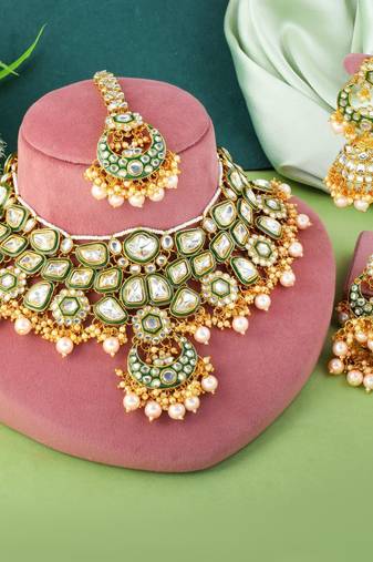 Traditional gold color kundan necklace set for wedding celebrations
