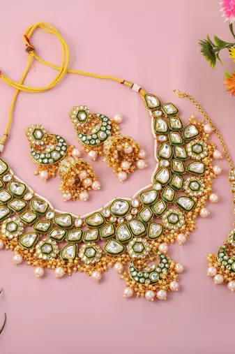 Traditional gold color kundan necklace set for wedding celebrations