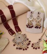 Maroon color kundan necklace set