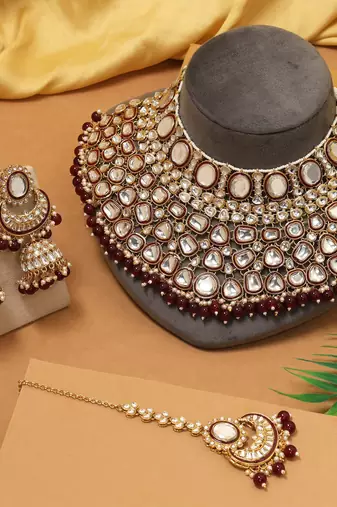 Maroon color kundan necklace set