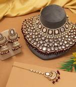 Maroon color kundan necklace set