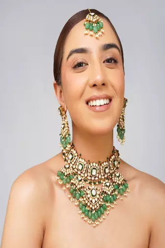 Gold plated kundan green stone necklace set